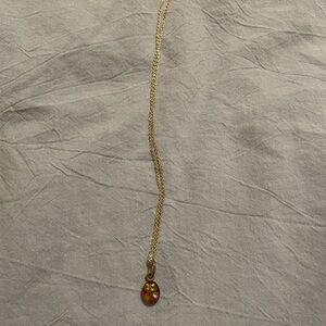 Chic Gold Necklace with Red Accent